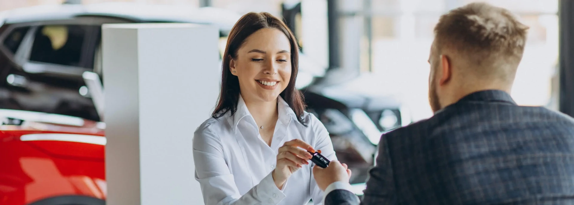 https://hillzcdn.ca/autoberrycanada/6543115014185255-man-with-sales-woman-car-showroom111111.webp