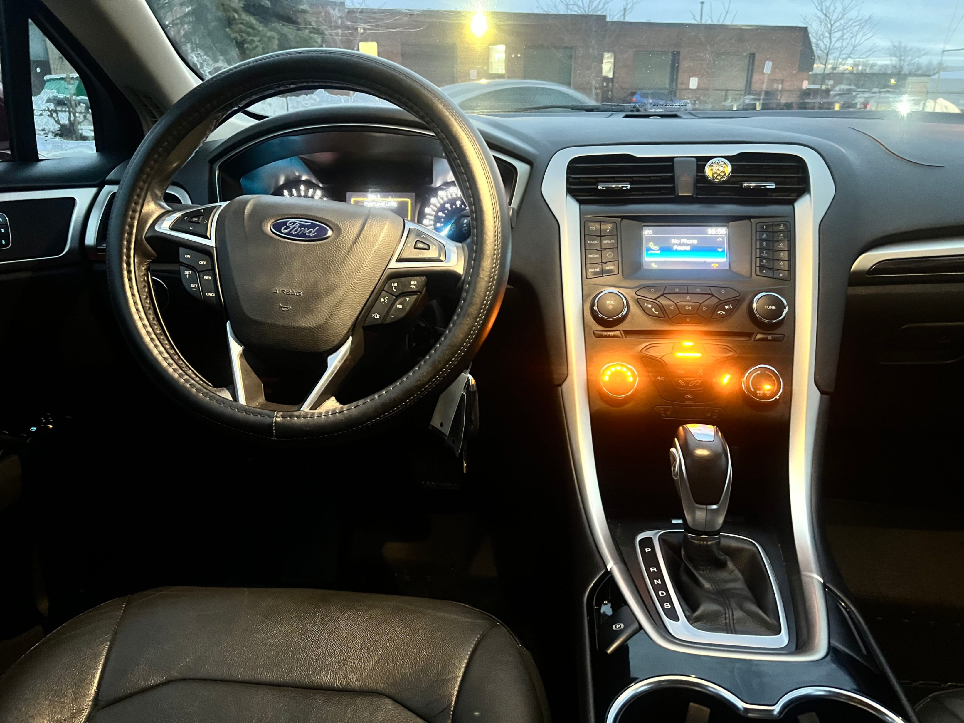 /autocainc/2014-Ford-Fusion-15055663903805216.jpg