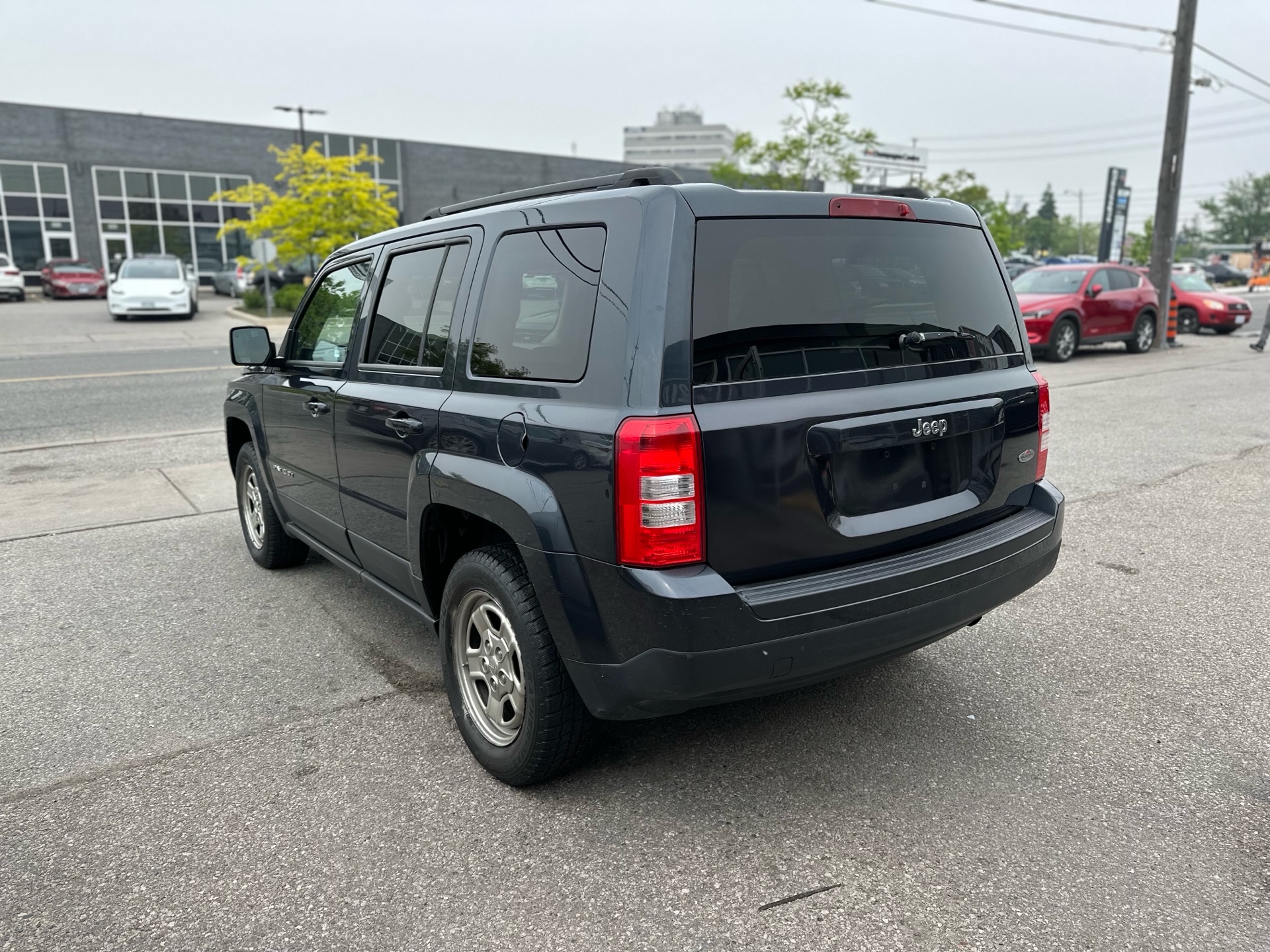 /autocainc/2014-Jeep-Patriot-6909020036500058.jpg