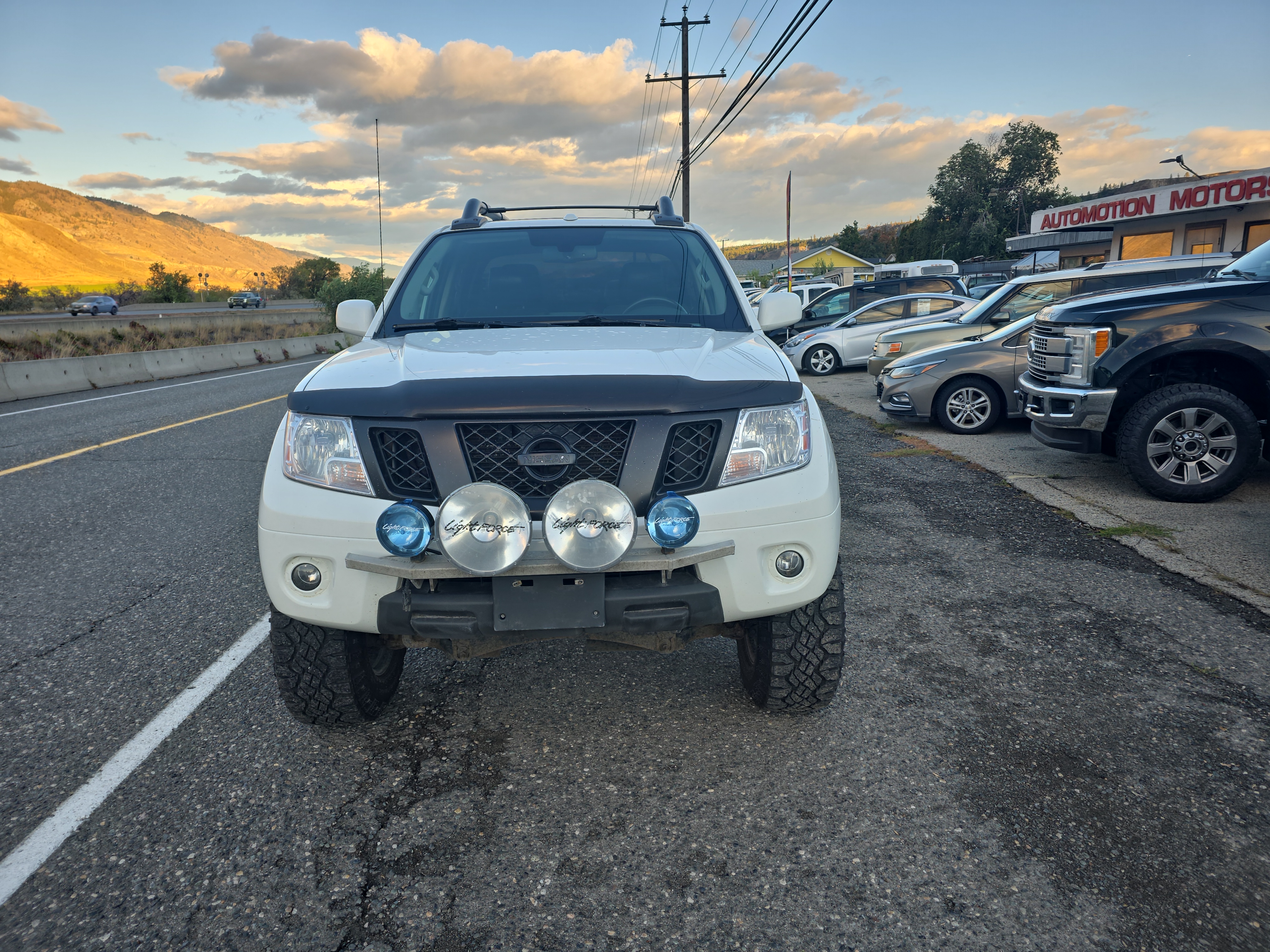 /automotionmotorsrvltd/2013-Nissan-Frontier-7938764789579791.jpg