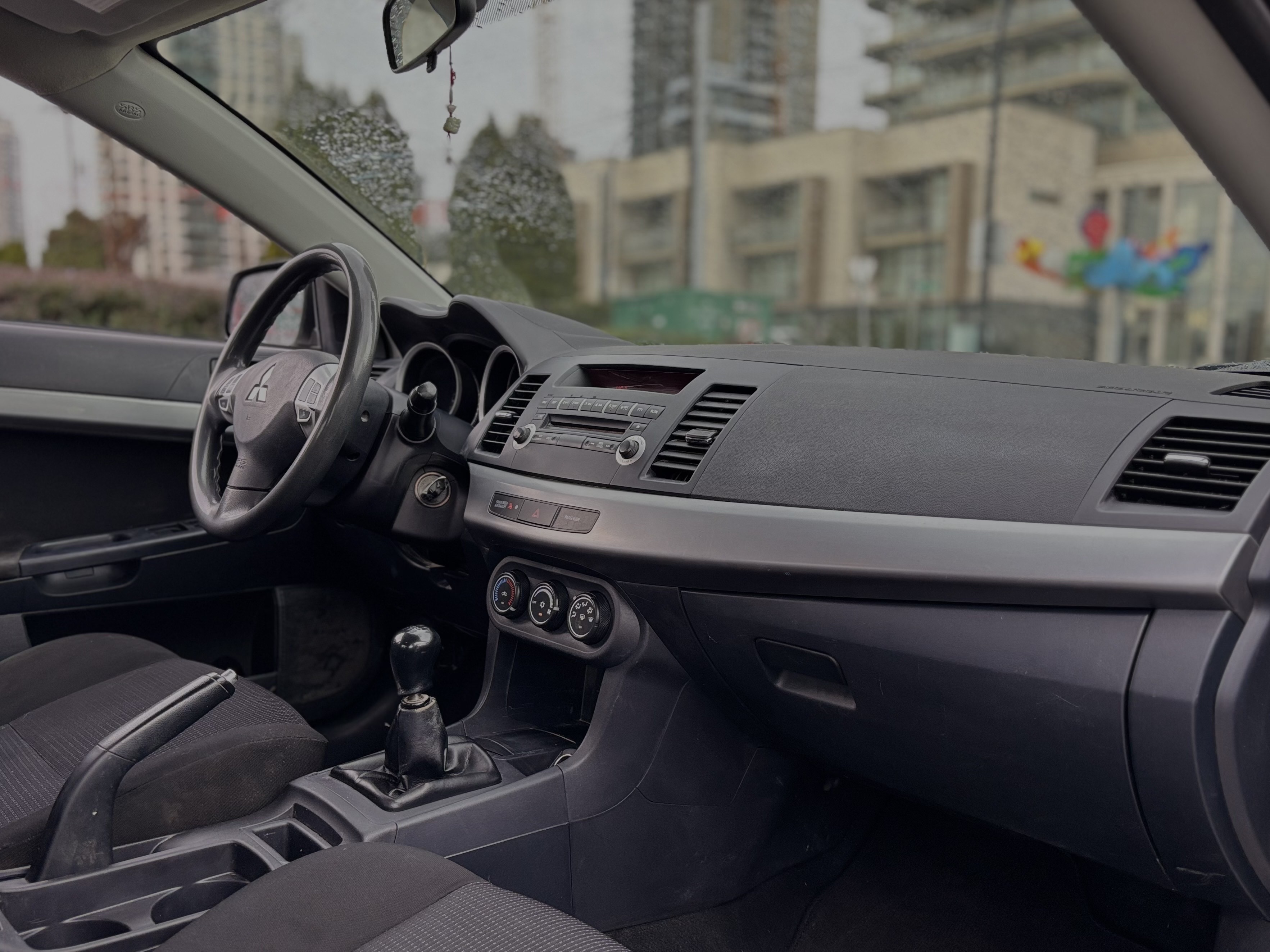 /canwestautoinc/2010-Mitsubishi-Lancer-30402452938515445.jpg