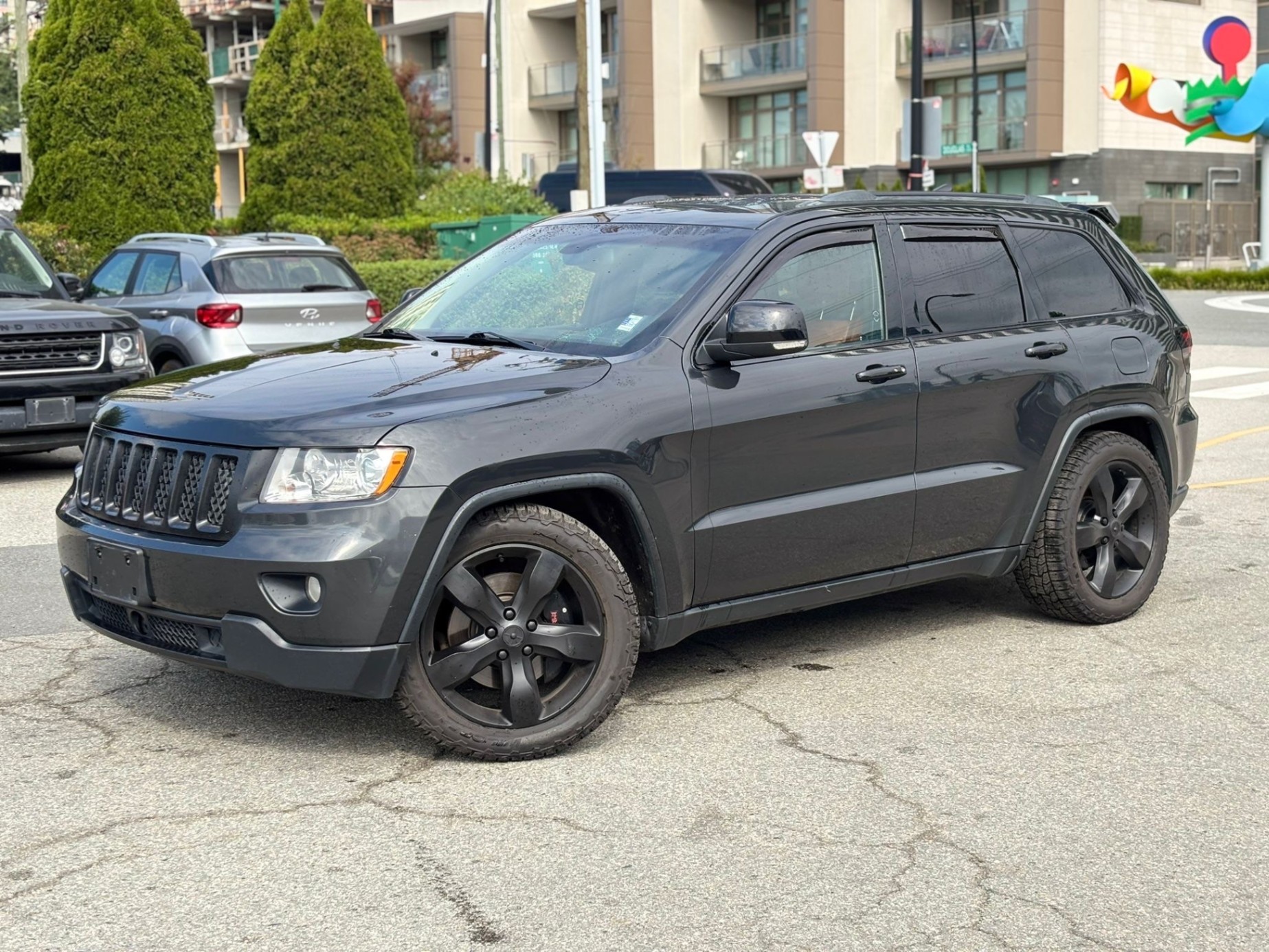 /canwestautoinc/2011-Jeep-GrandCherokee-003518064449349545.jpg