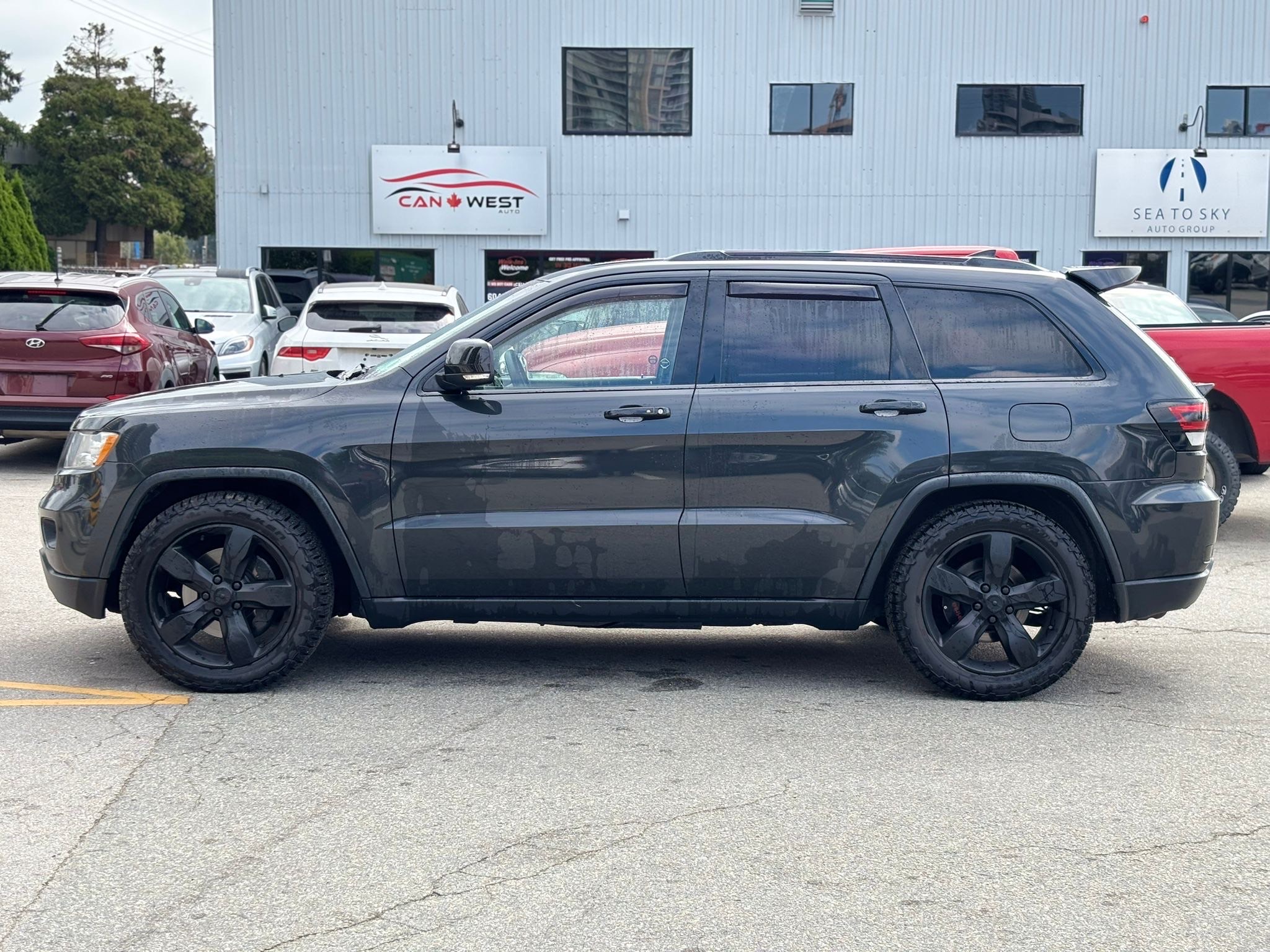 /canwestautoinc/2011-Jeep-GrandCherokee-6180698606940804.jpg