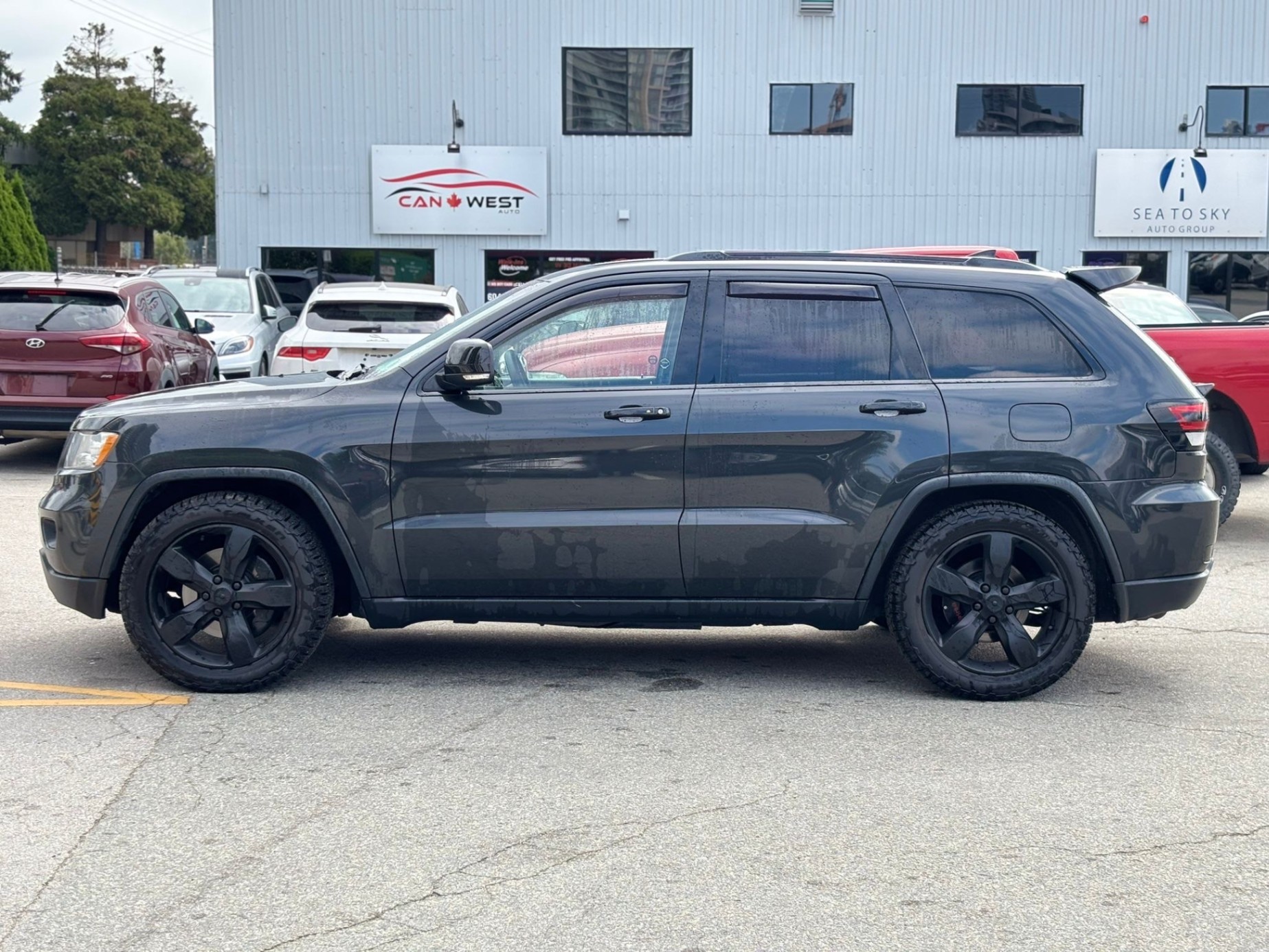 /canwestautoinc/2011-Jeep-GrandCherokee-6816356859122528.jpg