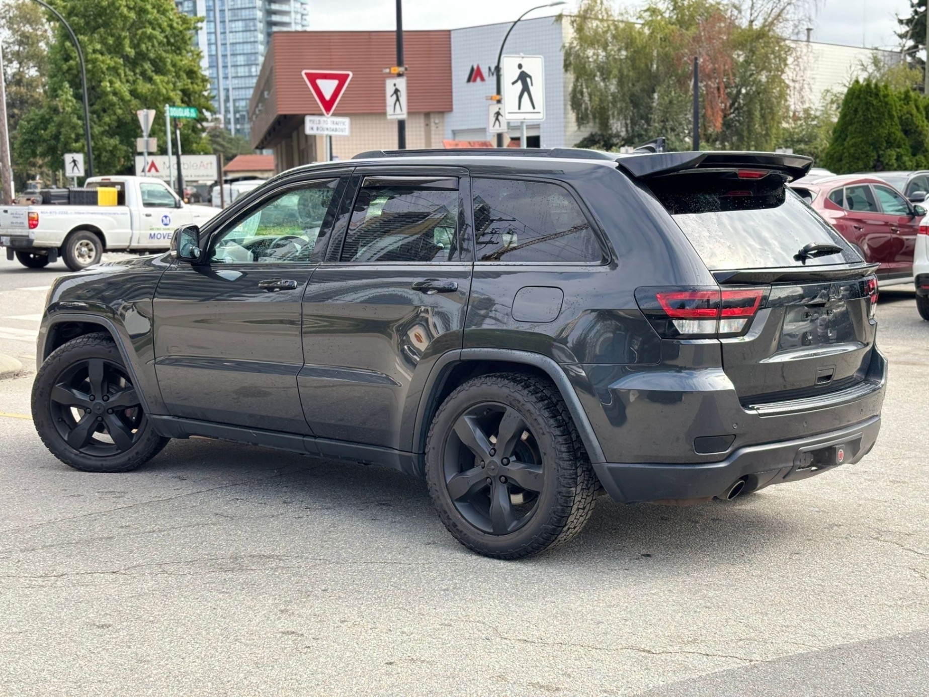 /canwestautoinc/2011-Jeep-GrandCherokee-9789990340765555.jpg