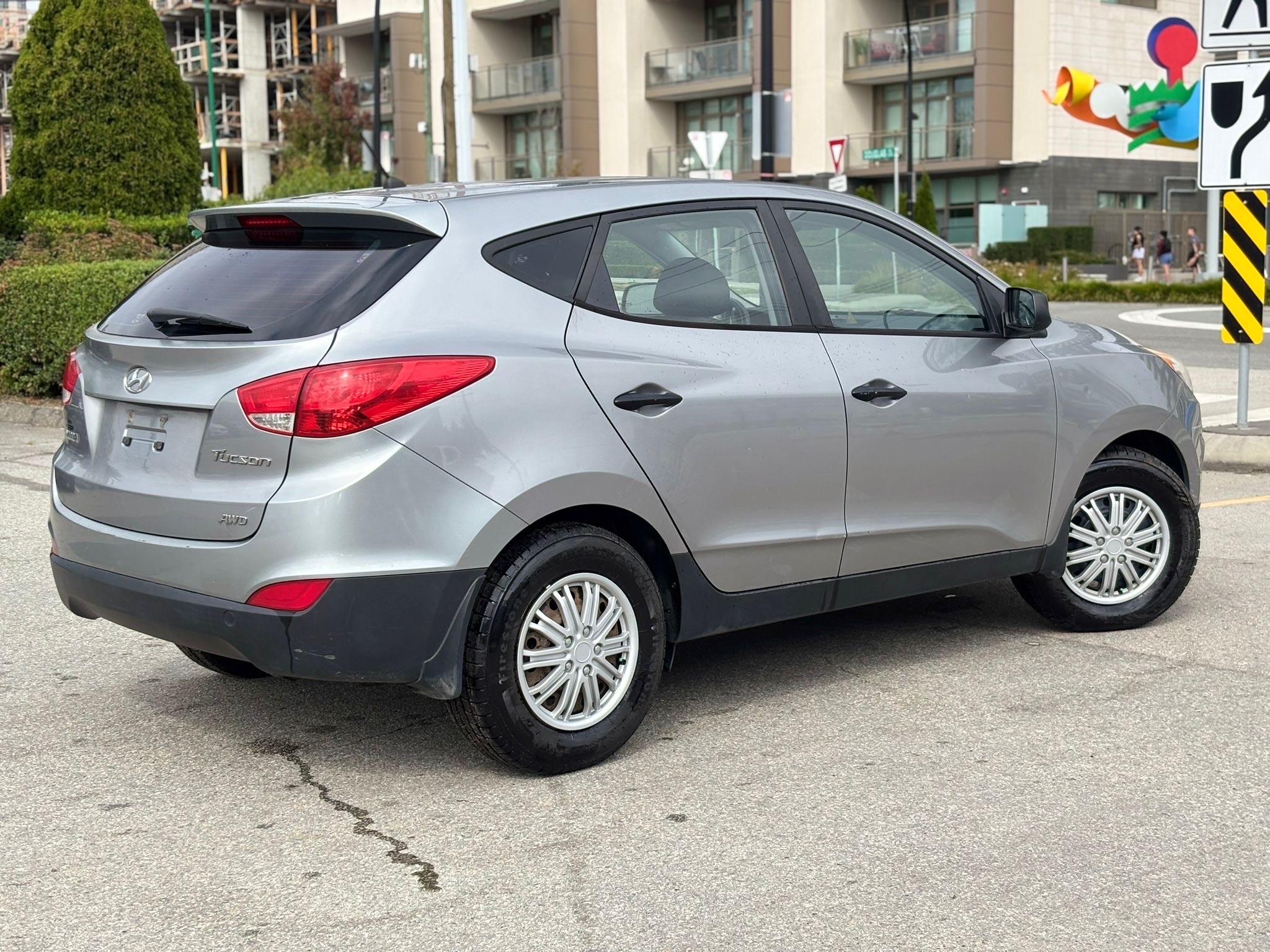 /canwestautoinc/2012-Hyundai-Tucson-2003841944664475.jpg
