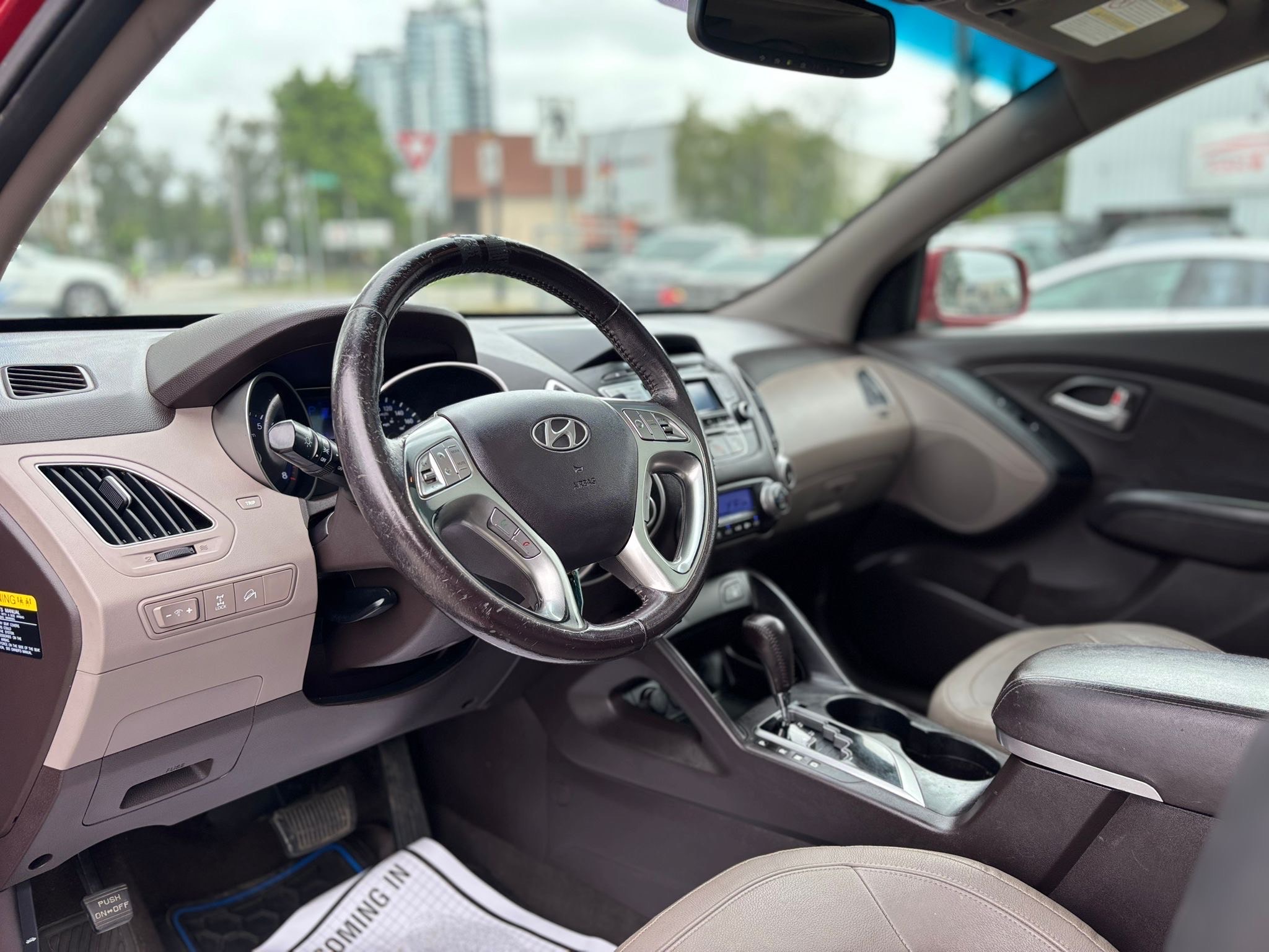 /canwestautoinc/2012-Hyundai-Tucson-3429569595582811.jpg