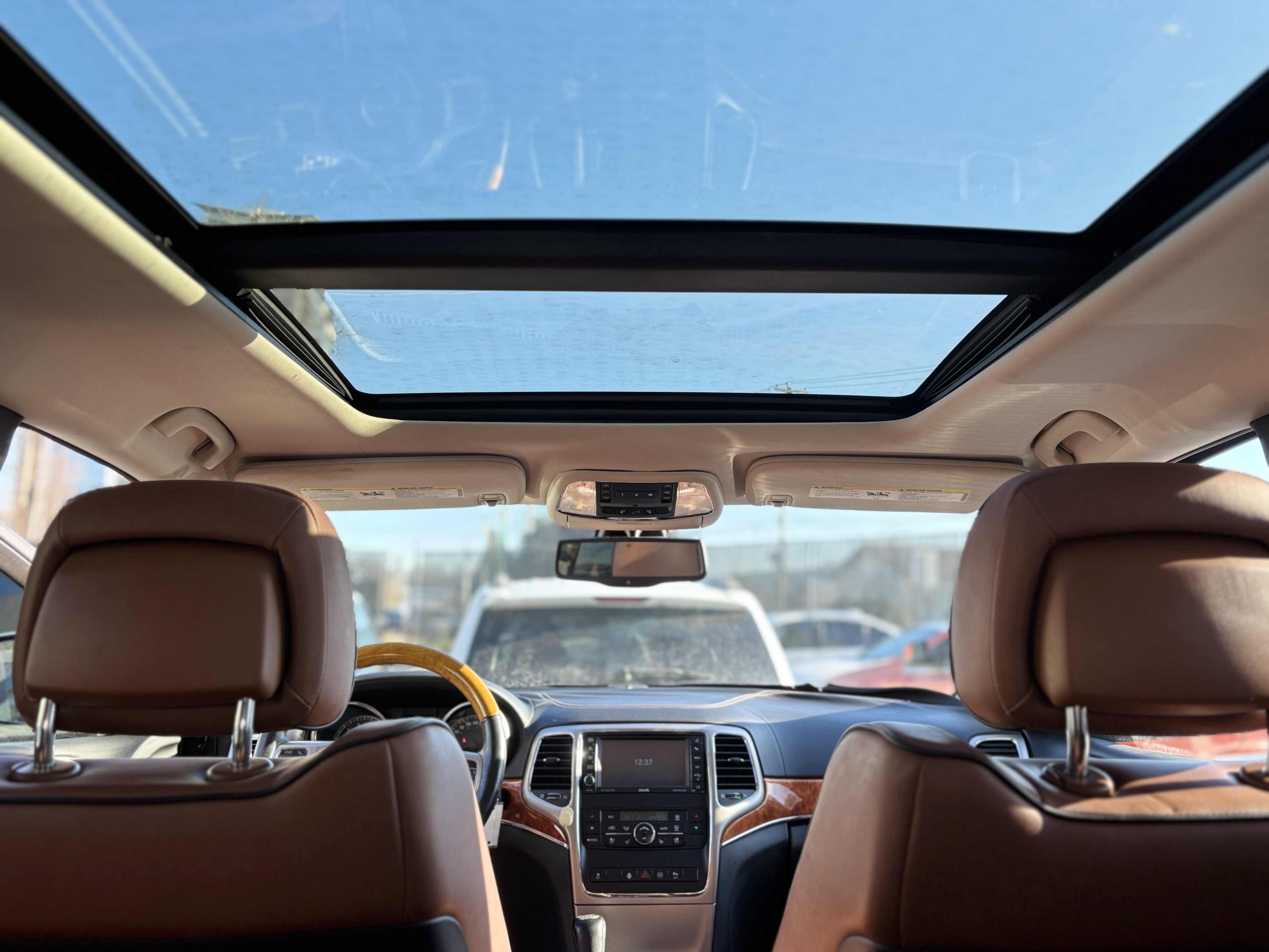 /canwestautoinc/2012-Jeep-GrandCherokee-3041384719546356.jpg