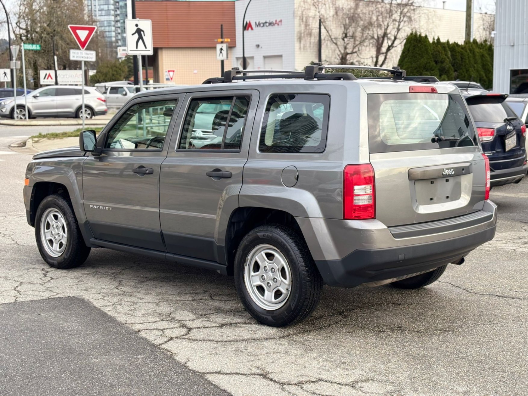 /canwestautoinc/2012-Jeep-Patriot-051431542599128965.jpg