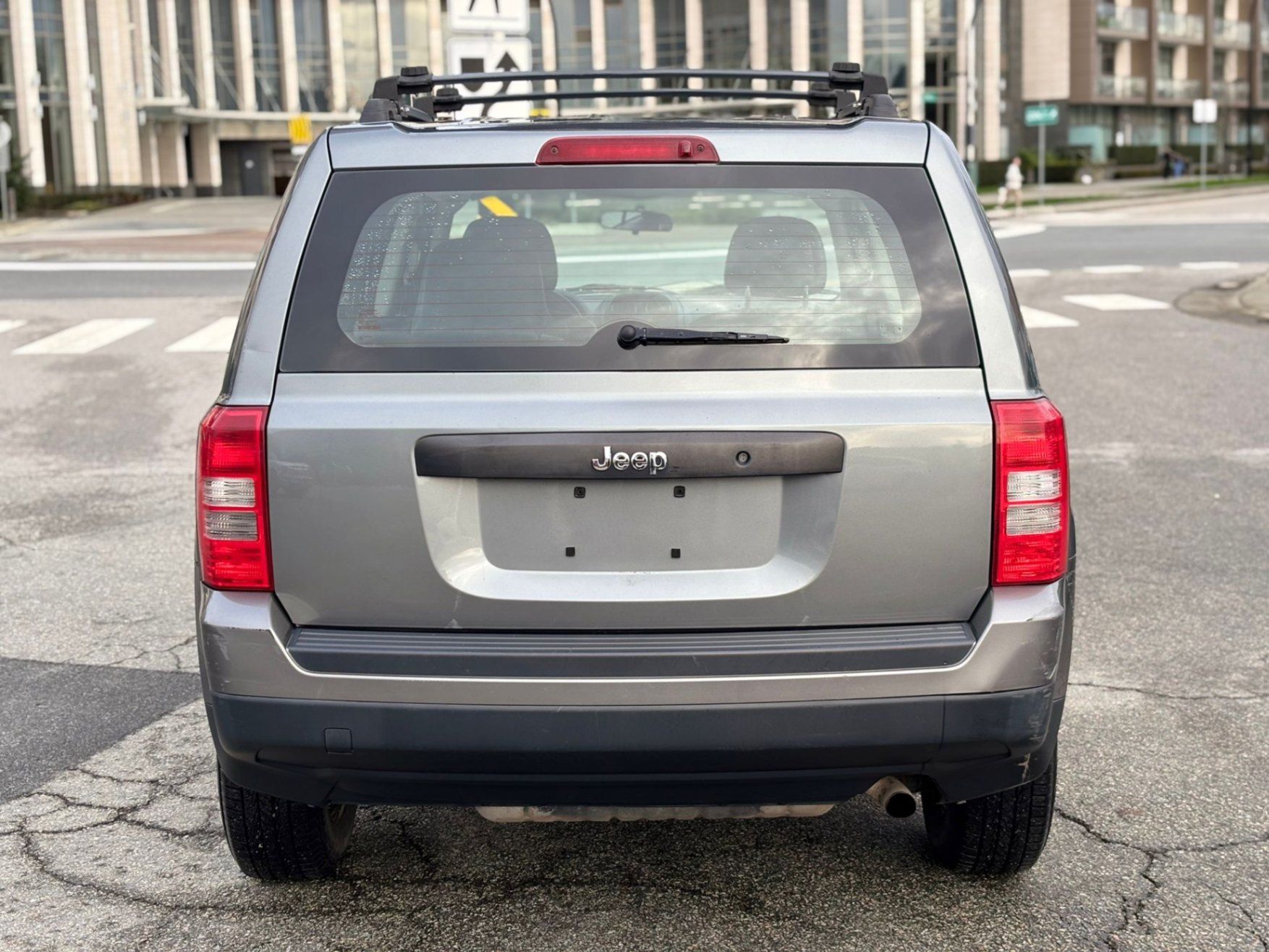 /canwestautoinc/2012-Jeep-Patriot-8714467163380635.jpg