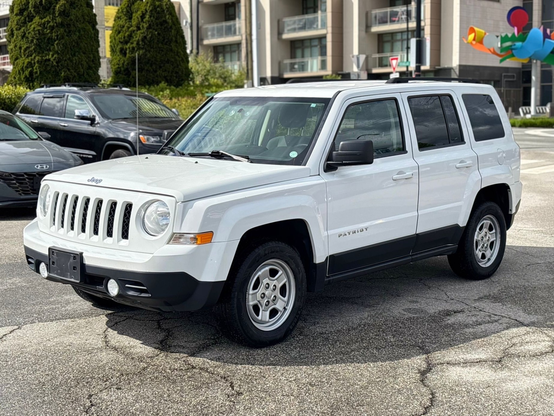 /canwestautoinc/2013-Jeep-Patriot-365890849501187.jpg