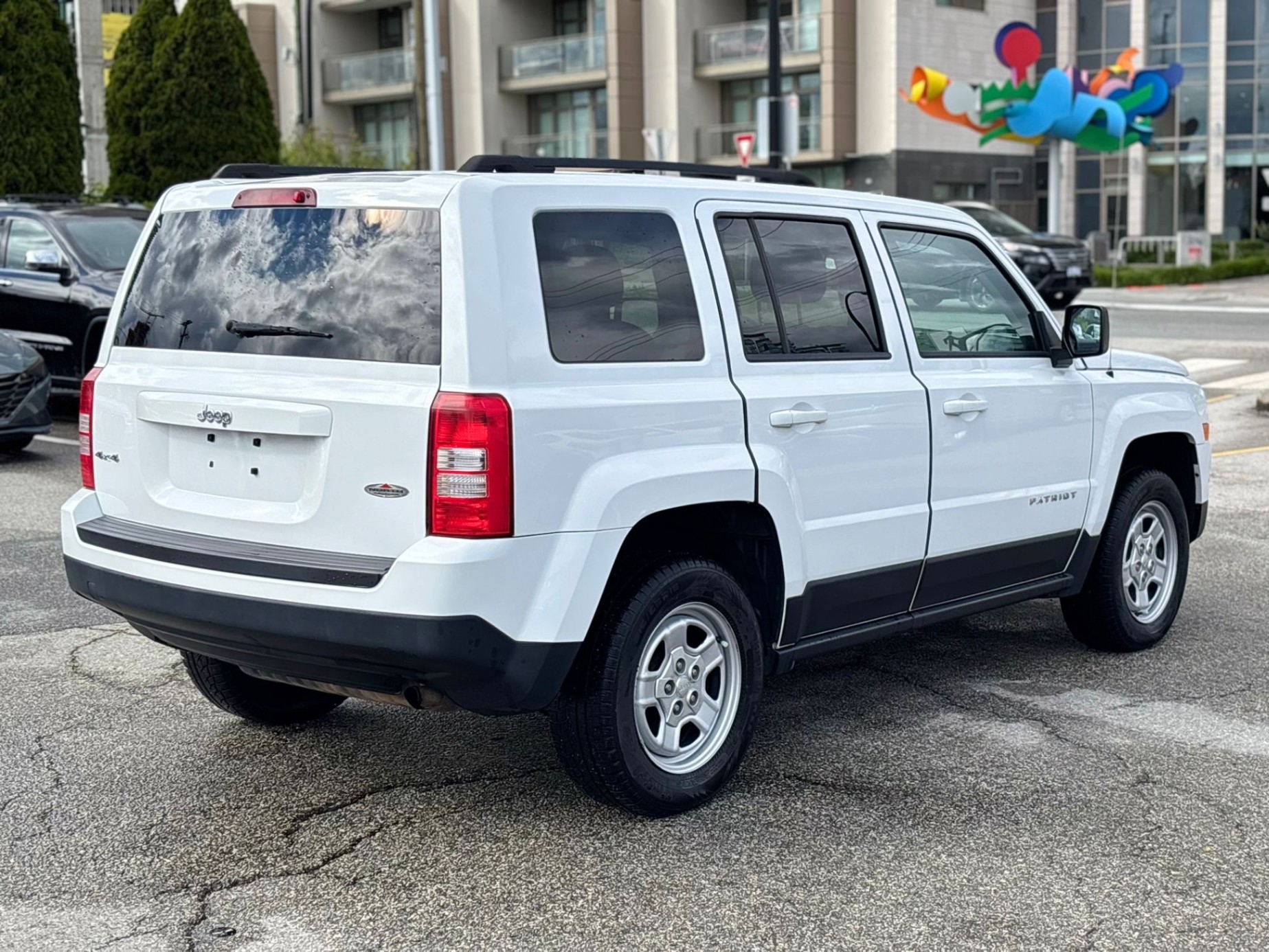 /canwestautoinc/2013-Jeep-Patriot-8322686499974341.jpg