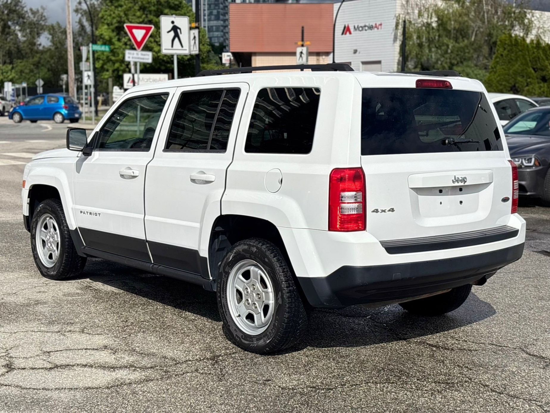 /canwestautoinc/2013-Jeep-Patriot-9741625519555017.jpg