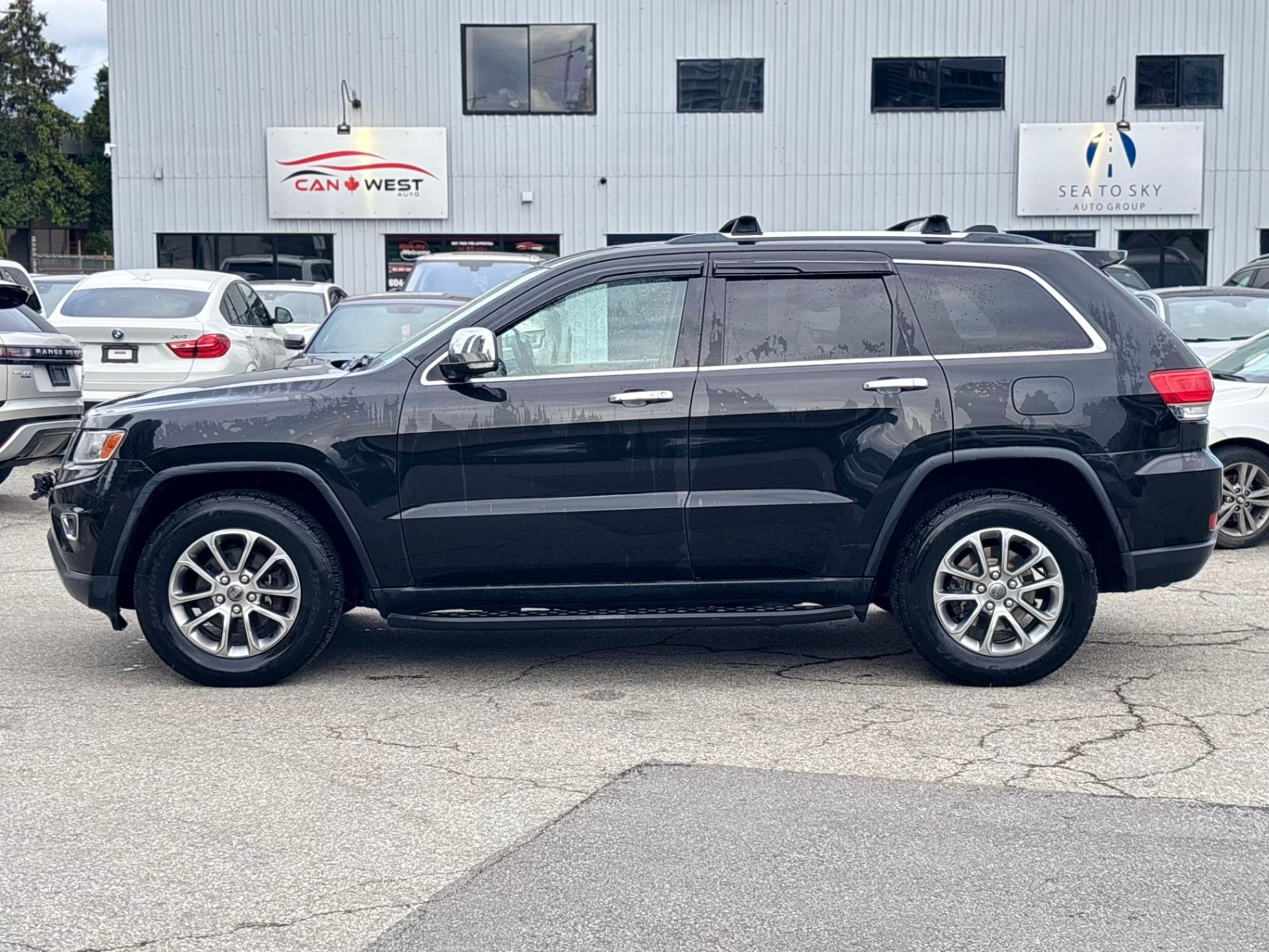 /canwestautoinc/2014-Jeep-GrandCherokee-7742305702832508.jpg