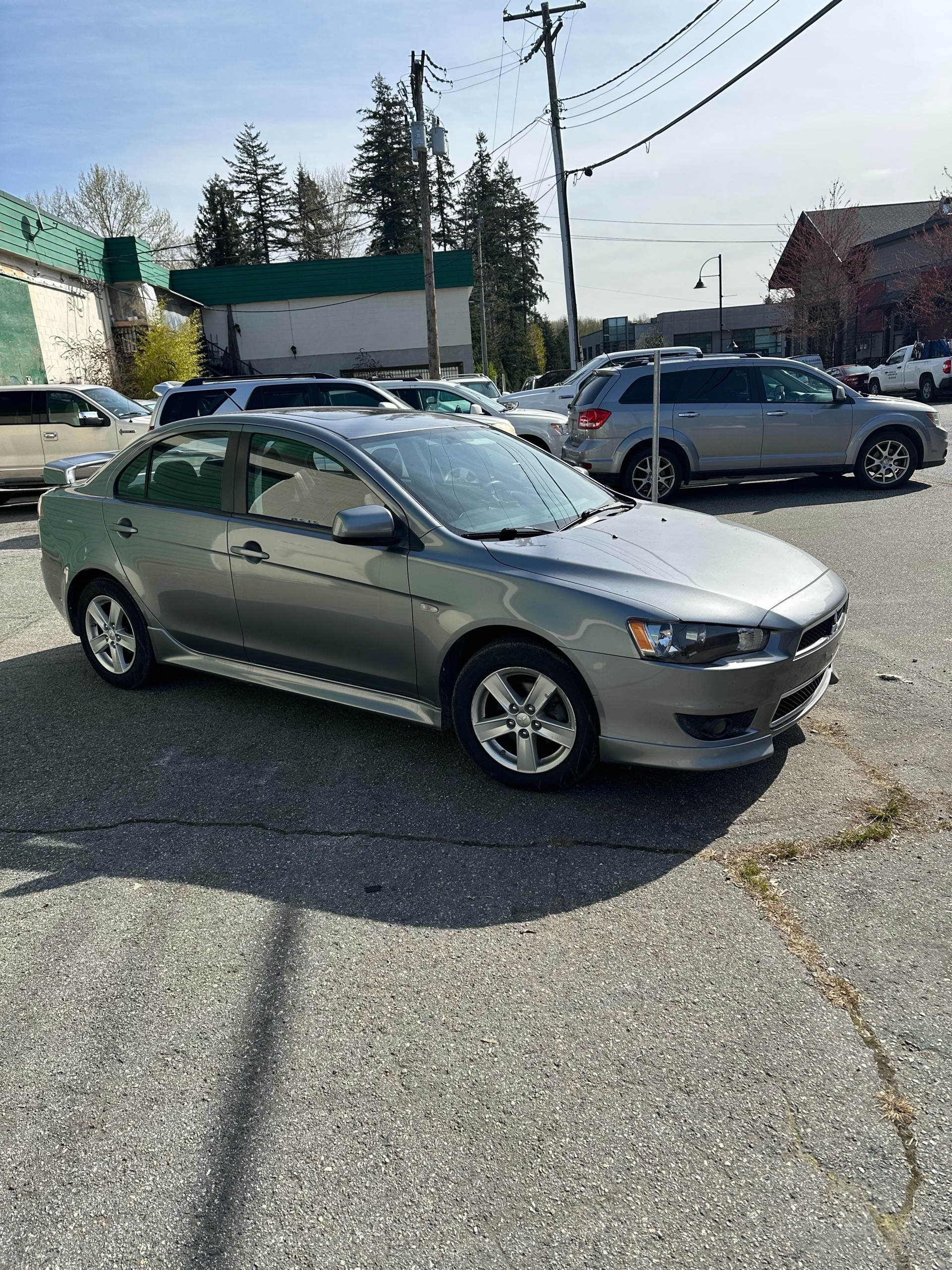 /canwestautoinc/2014-Mitsubishi-Lancer-7689356324852192.jpg