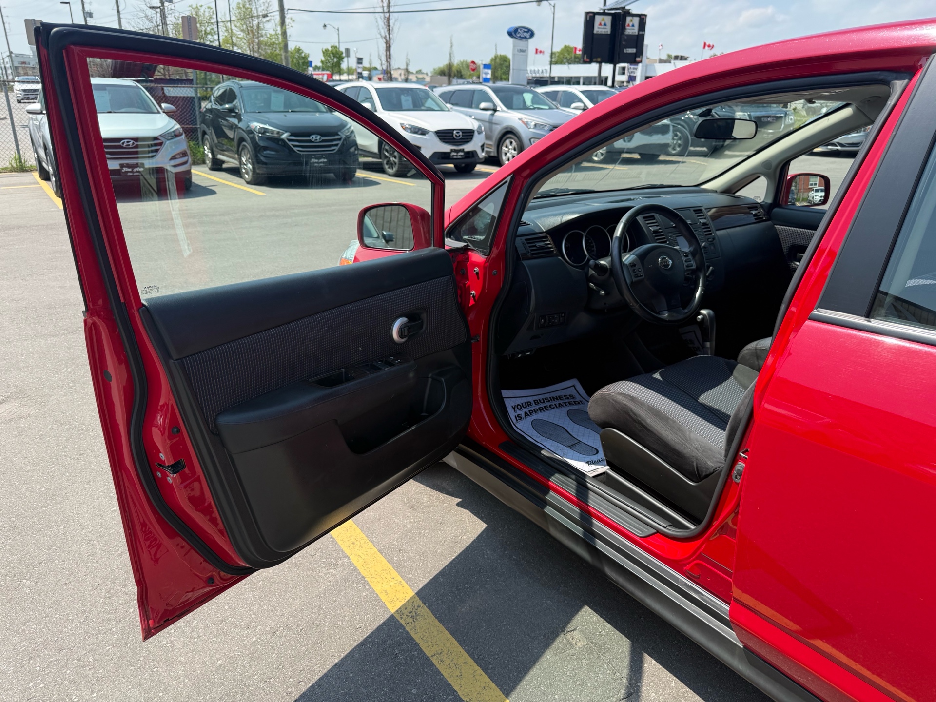 /carage/2011-Nissan-Versa-27870661679300124.jpg