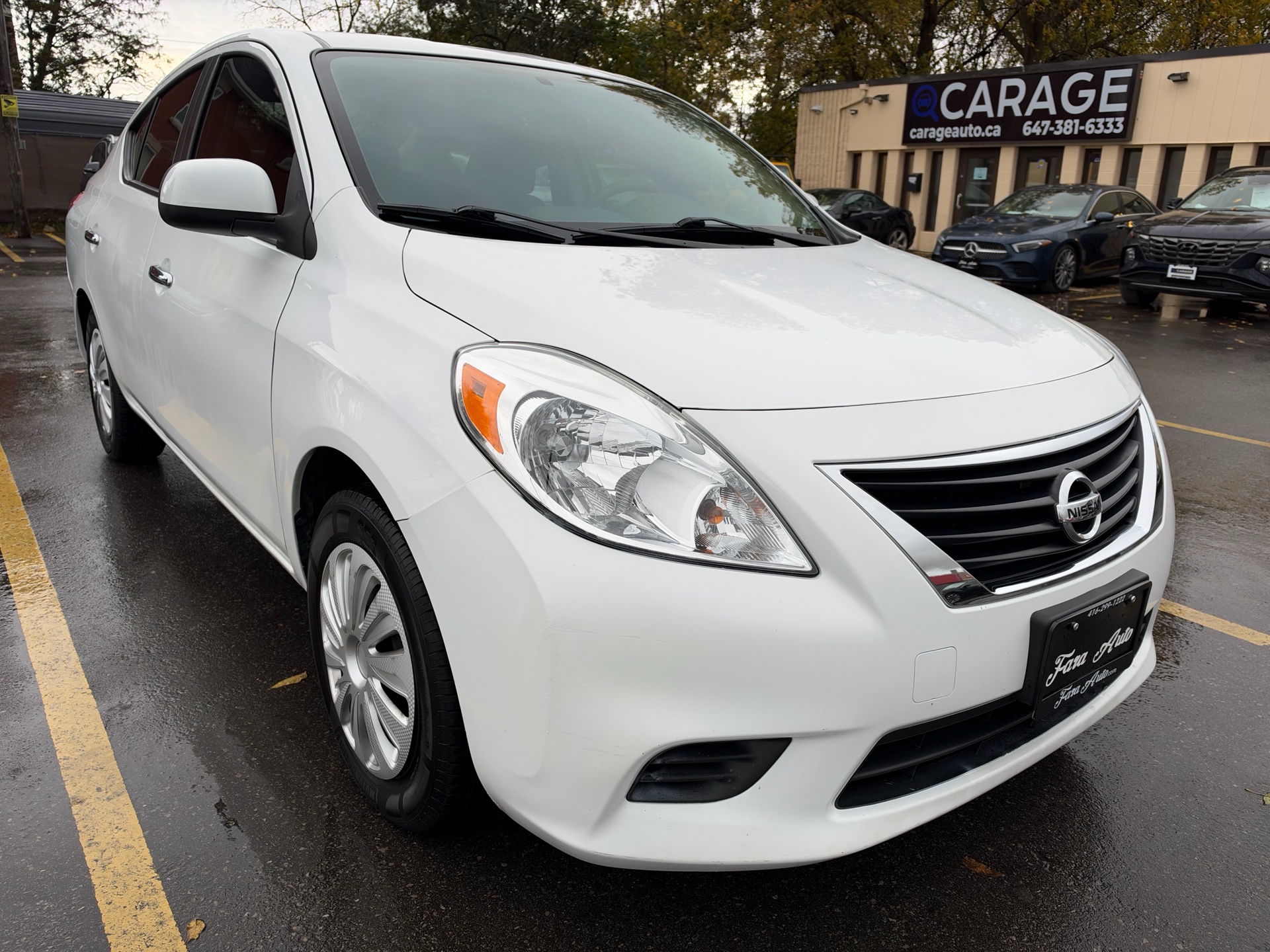 /carage/2012-Nissan-Versa-15174221526857123.jpg
