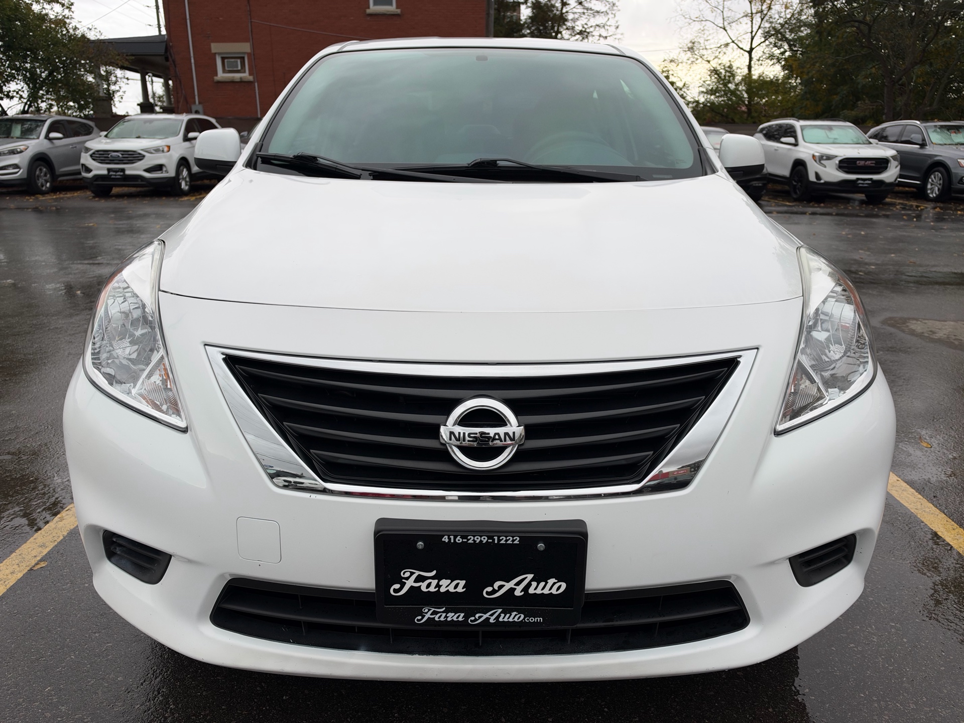 /carage/2012-Nissan-Versa-7729709093610129.jpg