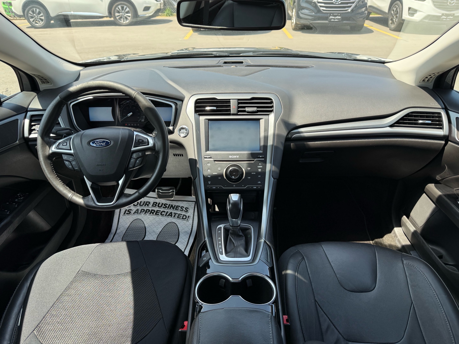 /carage/2014-Ford-Fusion-1652129315795221.jpg