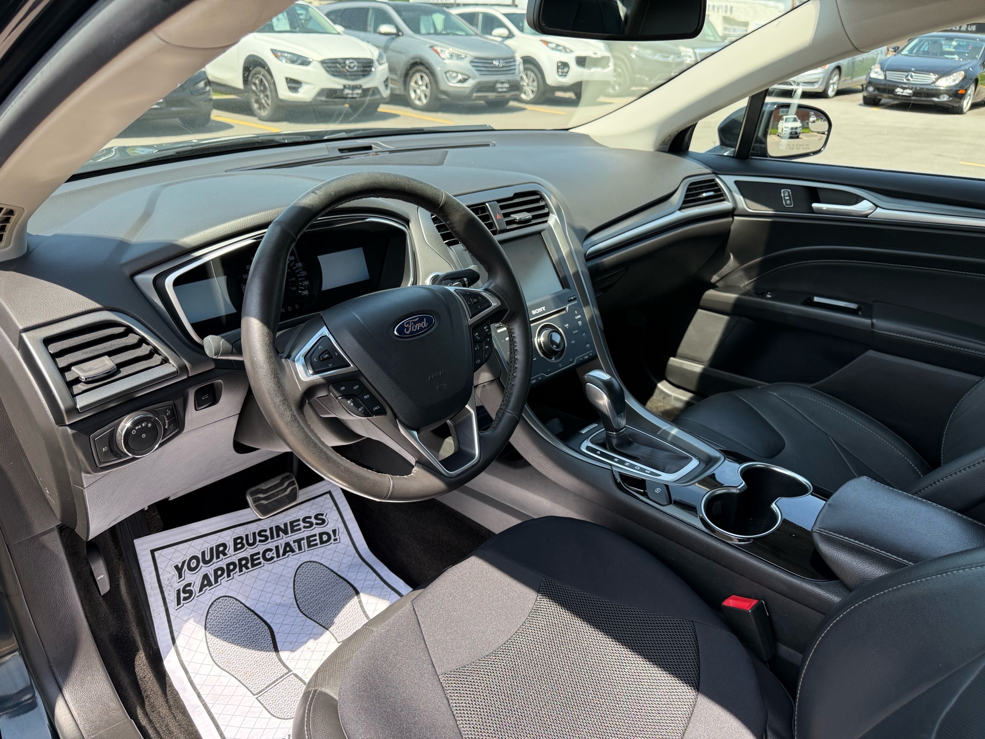 /carage/2014-Ford-Fusion-7677557587585033.jpg