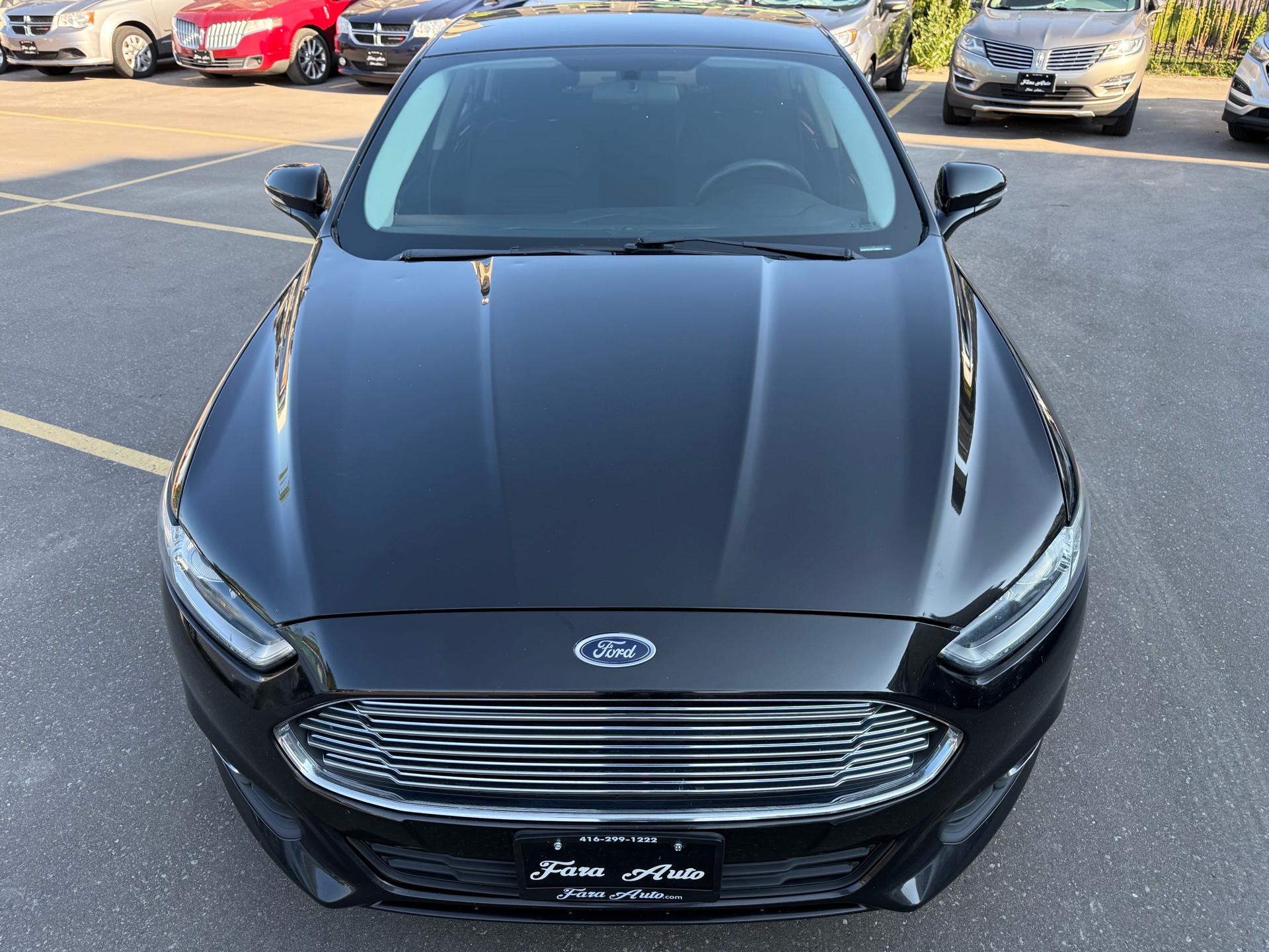 /carage/2015-Ford-Fusion-9886869735512183.jpg