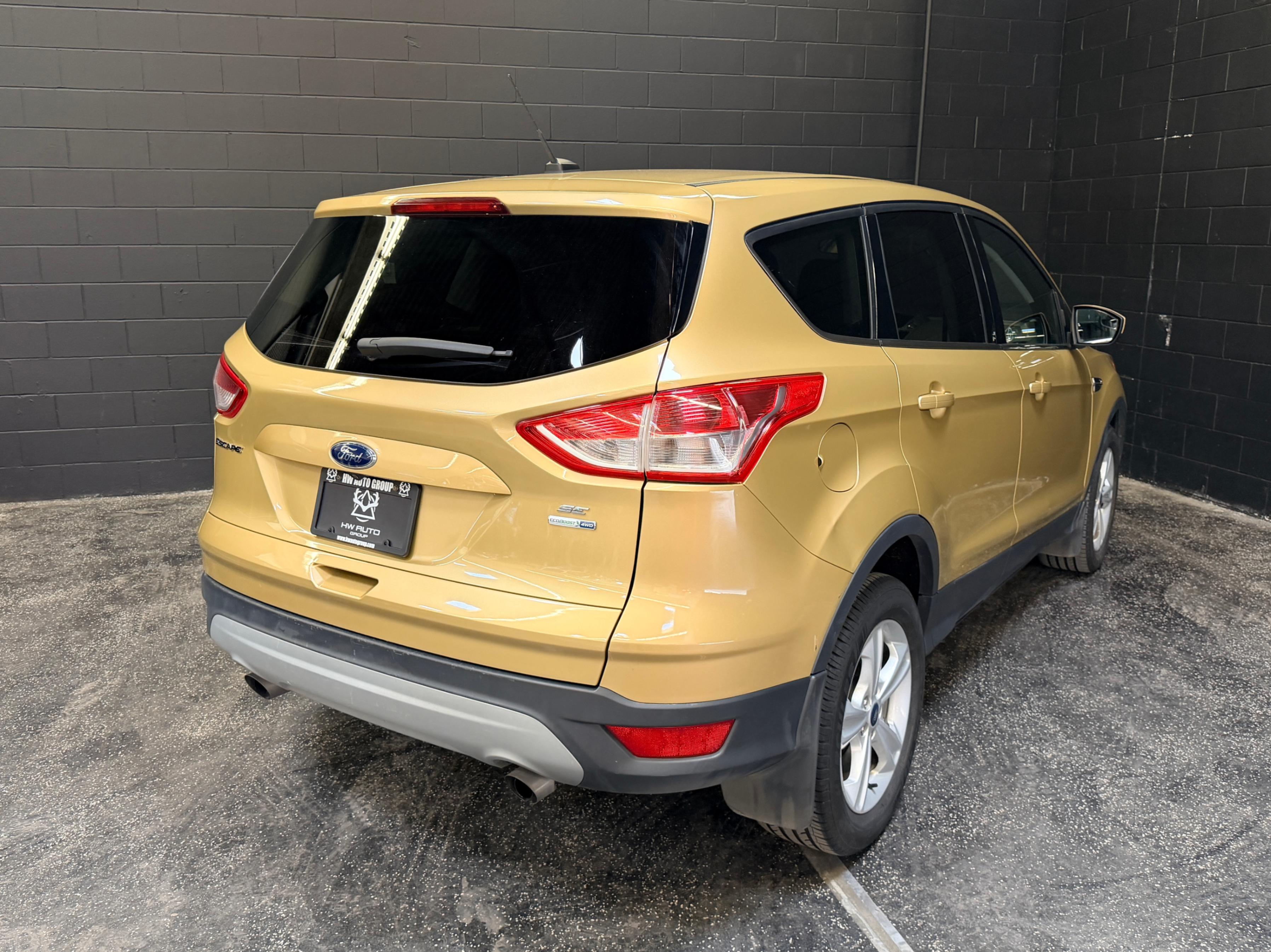 /hcwenterprisecorporation/2014-Ford-Escape-27837367619065256.jpg