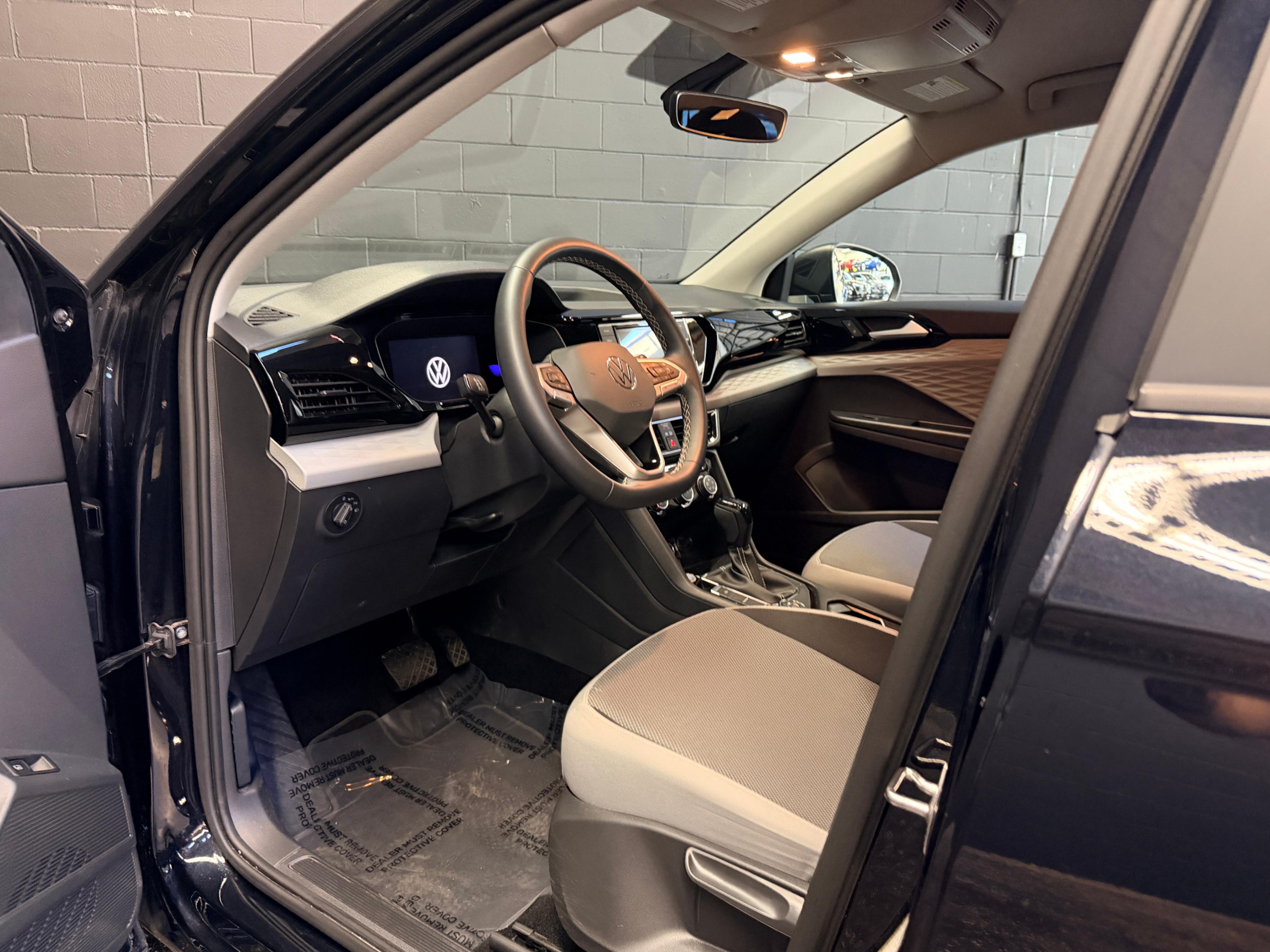 /hcwenterprisecorporation/2023-Volkswagen-Taos-7052146394648242.jpg