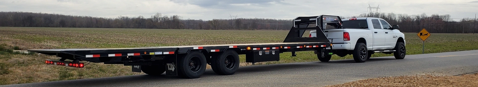 https://hillzcdn.ca/invictusroadsidesupportinc/36187514914820795-Flatbed__Truck_copy.webp