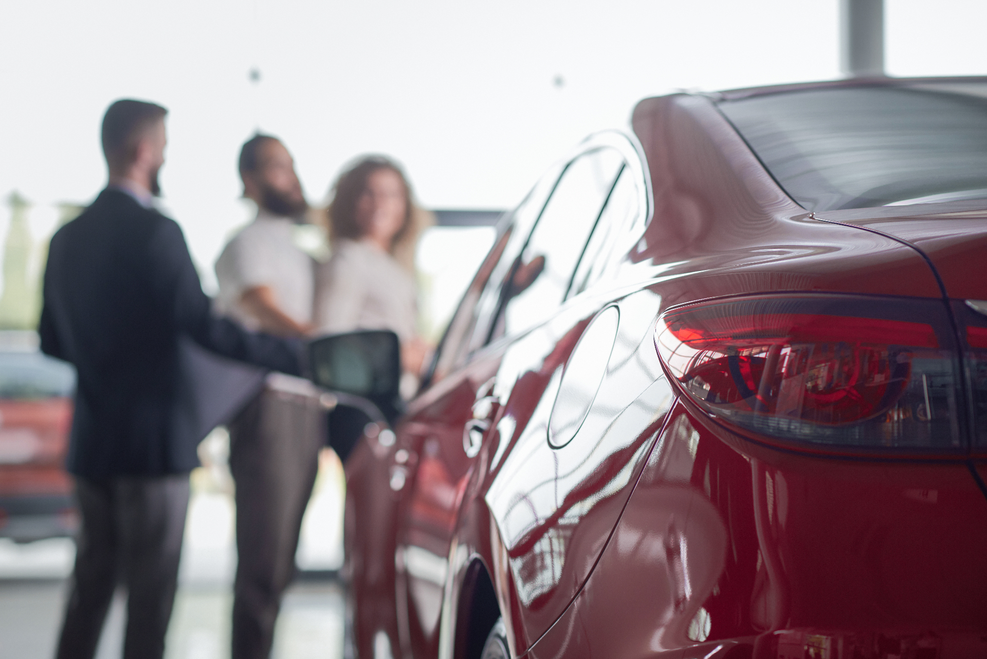 https://hillzcdn.ca/lionmotorsalesinc/16532591748295378-red-car-close-up-clients-car-dealership.jpg