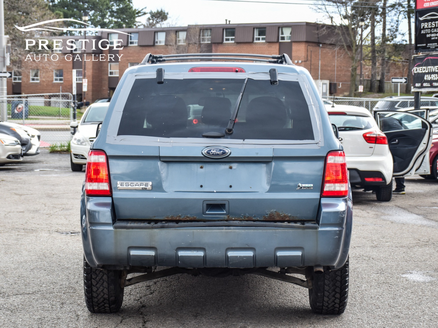 /prestigeautogallery/2012-Ford-Escape-040207290212558755.jpg