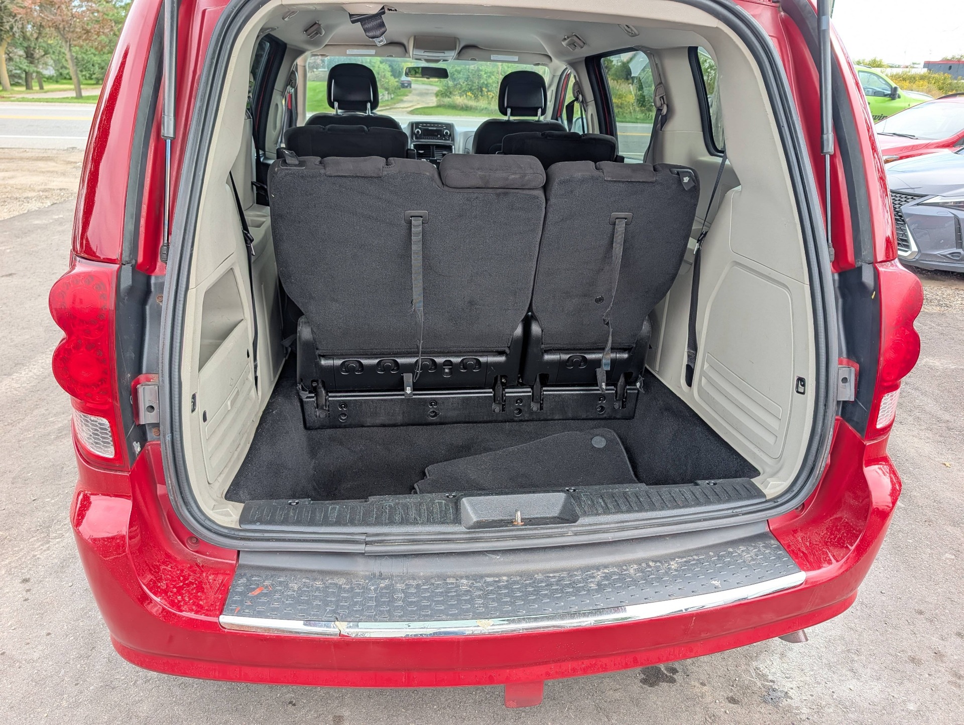 /rahmanmotors/2014-Dodge-GrandCaravan-24098628340517259.jpg