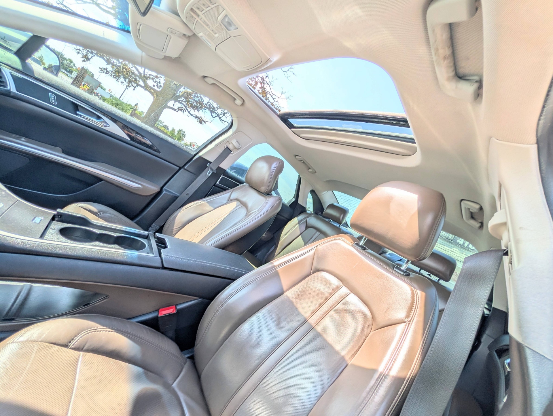 /rahmanmotors/2014-Lincoln-MKZ-38580172429647286.jpg